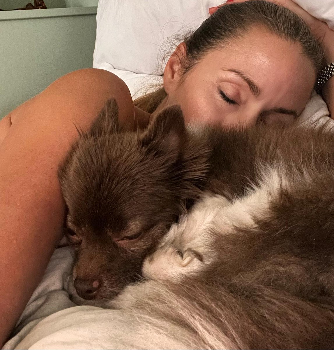 Wrapped in fur, love, and pure peace. 🐾💤
 There’s nothing like ending the day with the one who brings you unconditional comfort.