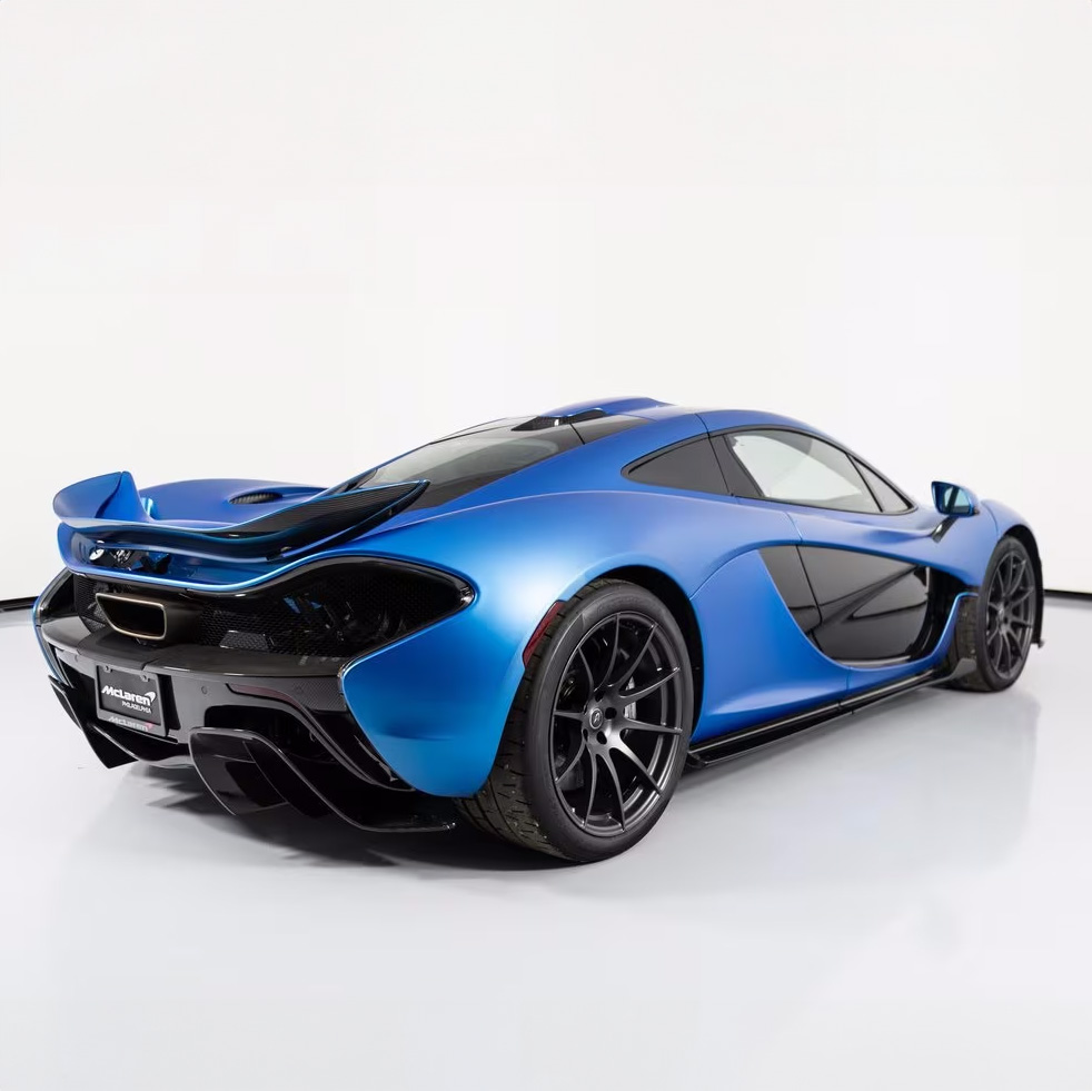duPontREGISTRY's tweet photo. 2014 McLaren P1 finished in MSO Azure Blue | Asking Price: $2,199,995

This example just had the HDA Hybrid Assembly replaced, New Gen 2 HV Battery installed and the accumulators replaced! The options include Midnight Blue Alcantara throughout, Snorkel in Visual Carbon Fiber, Door Mirror & Arm in Gloss Carbon Fiber, Stealth Pack, Rear Clam Insert in Gloss Carbon Fiber, Rear Wing Visual Carbon Fiber & more!