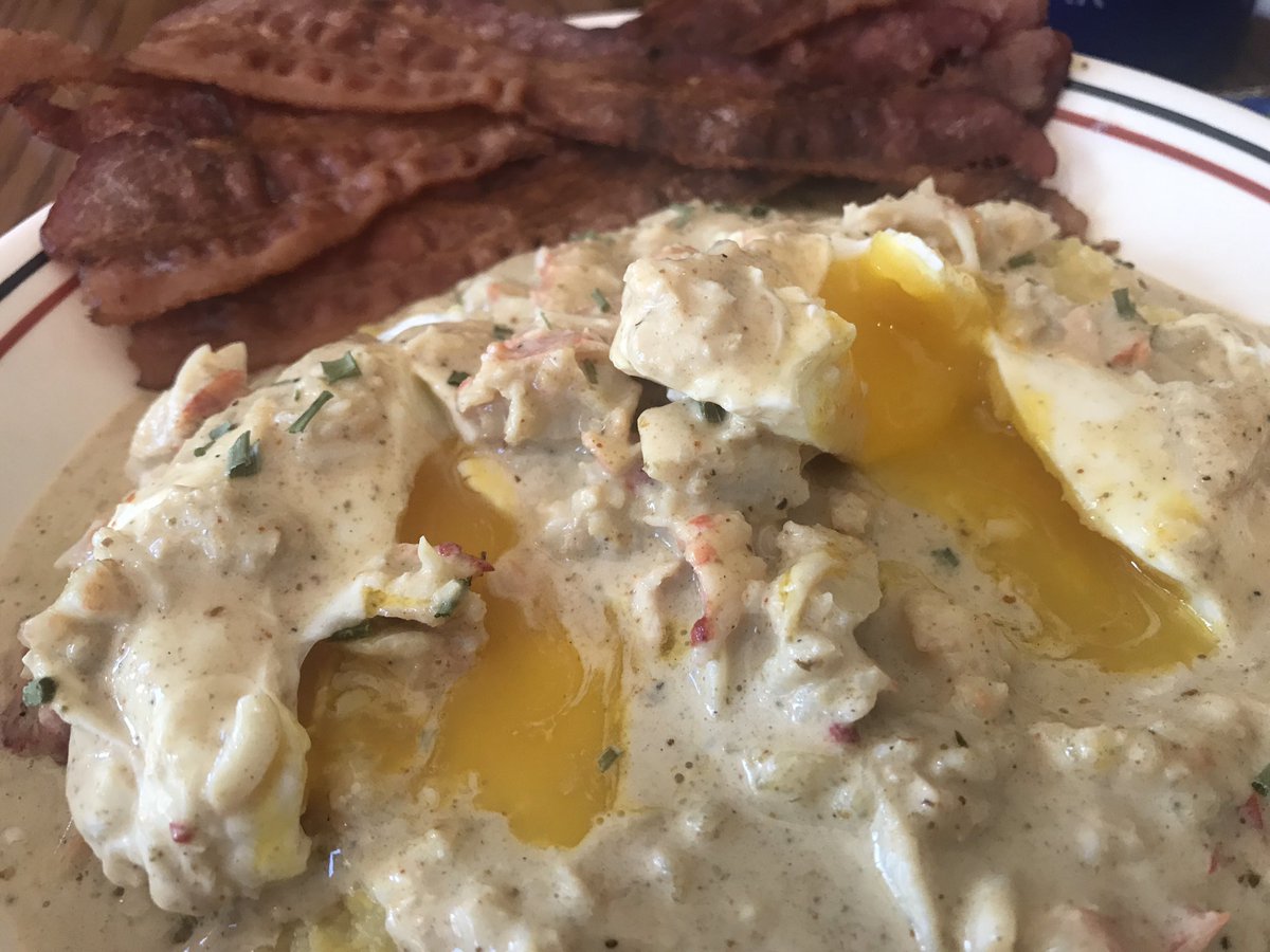 #SundayBrunch #Leftovers slim pickin’s in the ‘fridge! Jalapeño grits with a crab/cheese sauce over poached eggs. Apple juice and coffee