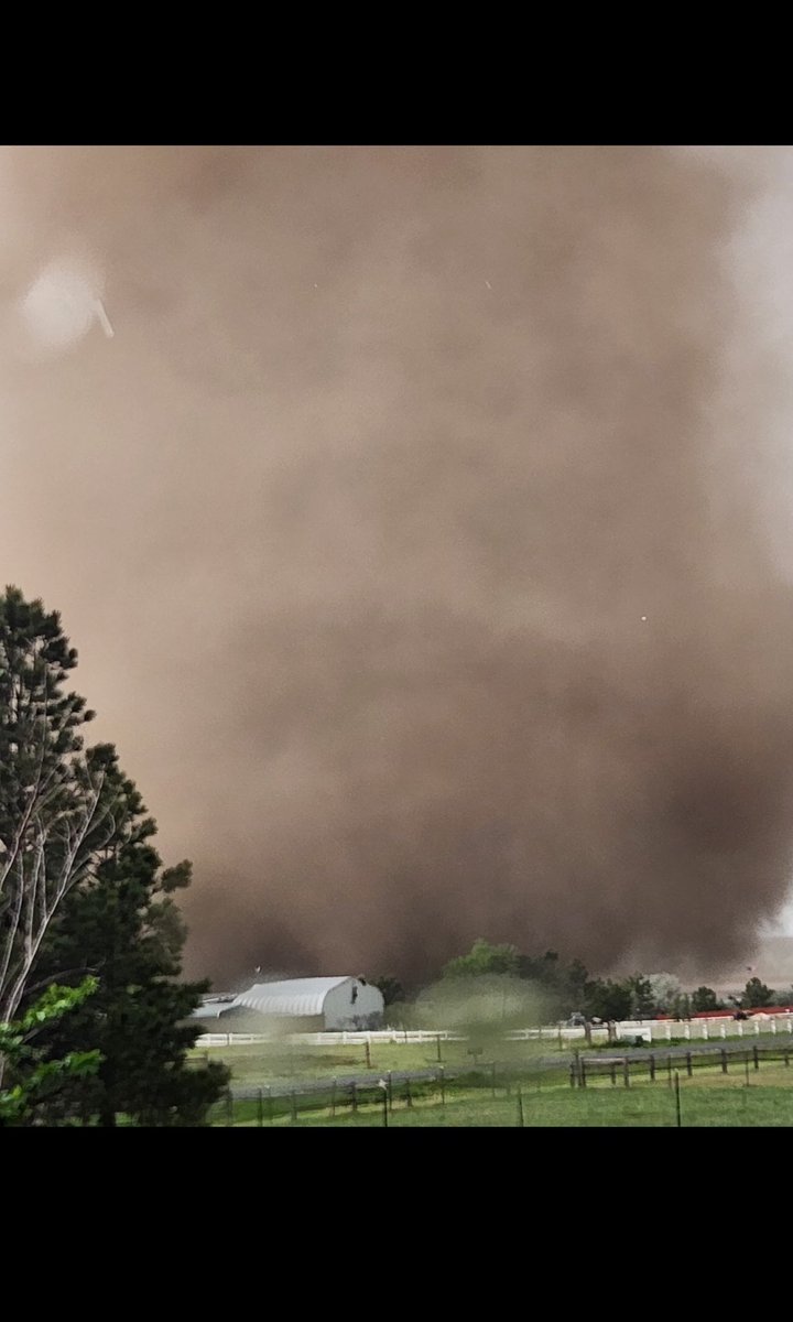 It’s exciting chasing storms.  But it gives a whole new meaning to it when you have a stout tornado in your back yard! Earlier today across the street from our house near Bennett, CO. From  our neighbor Ryan Hagel. Unfortunately our neighbors had damage and farm animals lost
