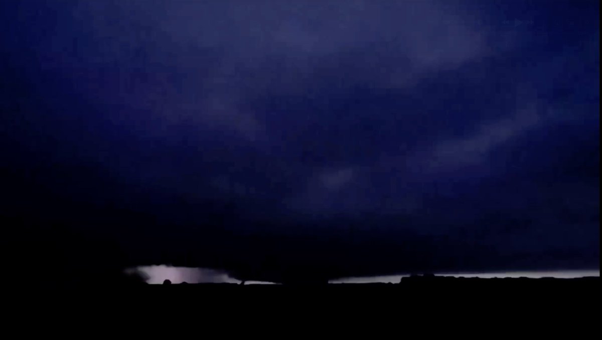 anthonytaylorwx's tweet photo. HUGE WEDGE RIGHT NOW ON @VinceWaelti's STREAM! Screenshot taken a few minutes ago. Slowing down frame by frame, appears there is at least one satellite tornado, if not multiple. https://t.co/TsOv7Gu0KC