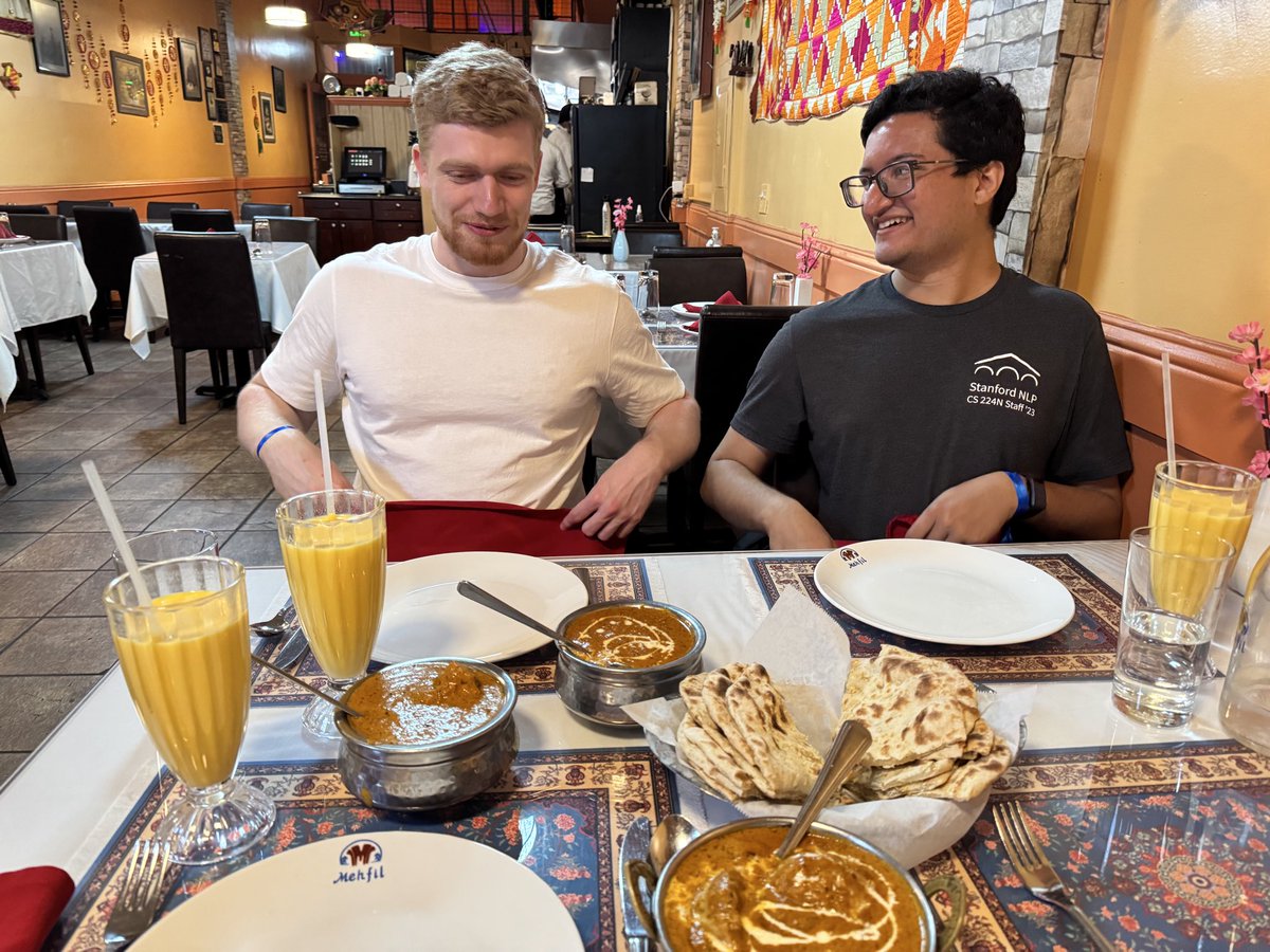 khoomeik's tweet image. let the white guy order for the table and he got 3 butter chickens, 3 garlic naans, and 3 mango lassis