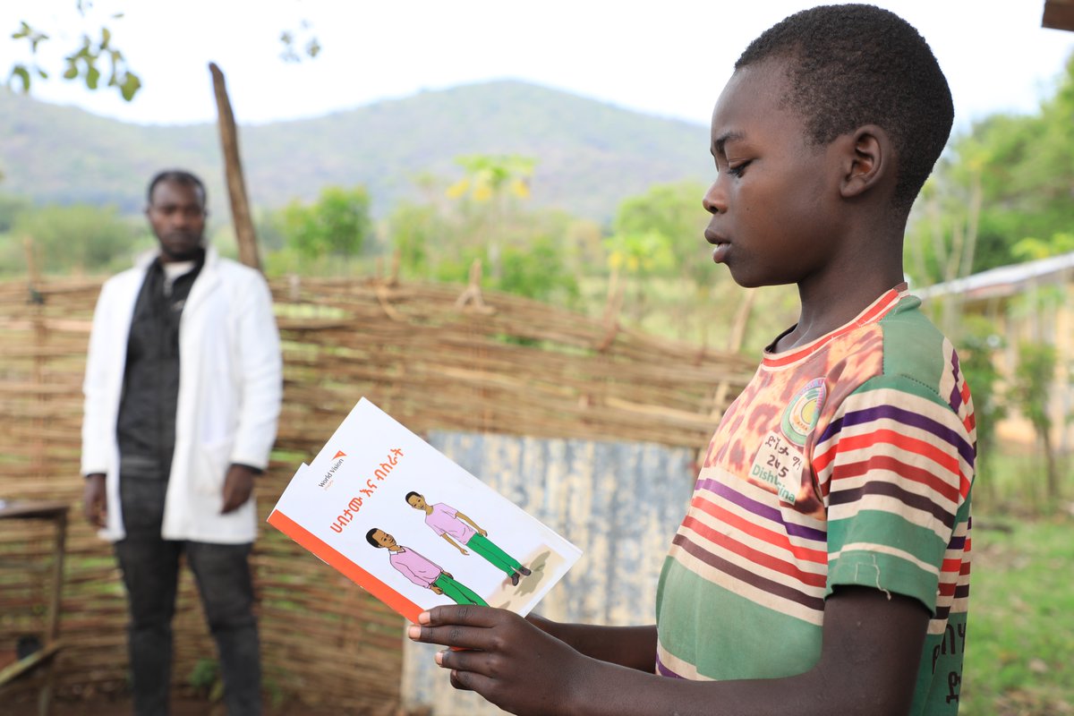 WorldVisionEth's tweet image. Abenezer, 10, used to struggle with reading. In collaboration with local schools, we set up outdoor reading parks, shaded spaces where #children who struggle with reading can get extra support during recess. Now he’s one of the top readers in his class.

#ReadingMatters