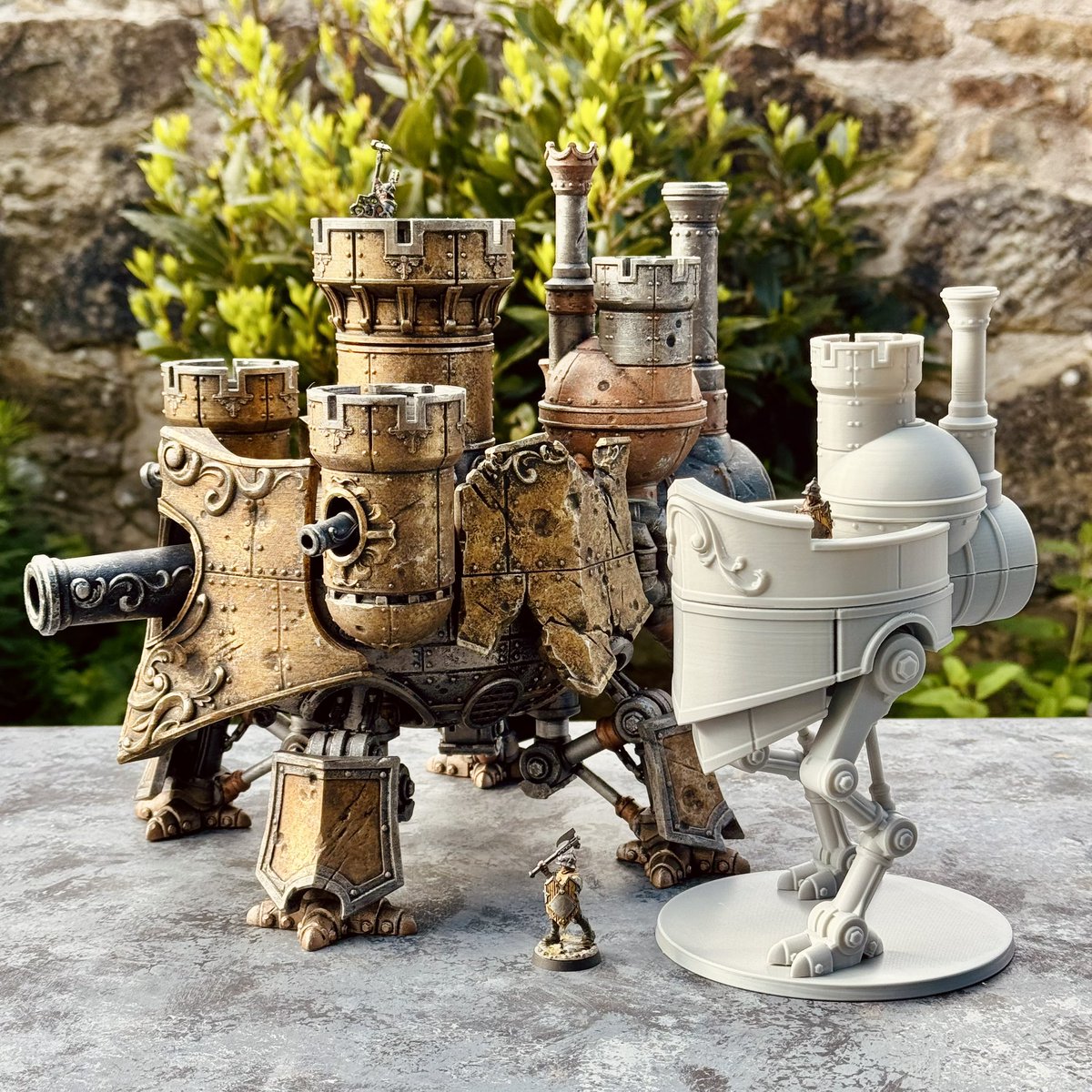 Dark_Fantastic's tweet photo. Productive Monday at the Dark Mills! We’re adding a smaller ‘scout’ walker to the Steam Fort range, and the process starts with a test print for scale and a paint over to decide on details - it’s on a 130mm base, so could be ideal as a Mega Gargant sub? https://t.co/KvcjfJTgIq