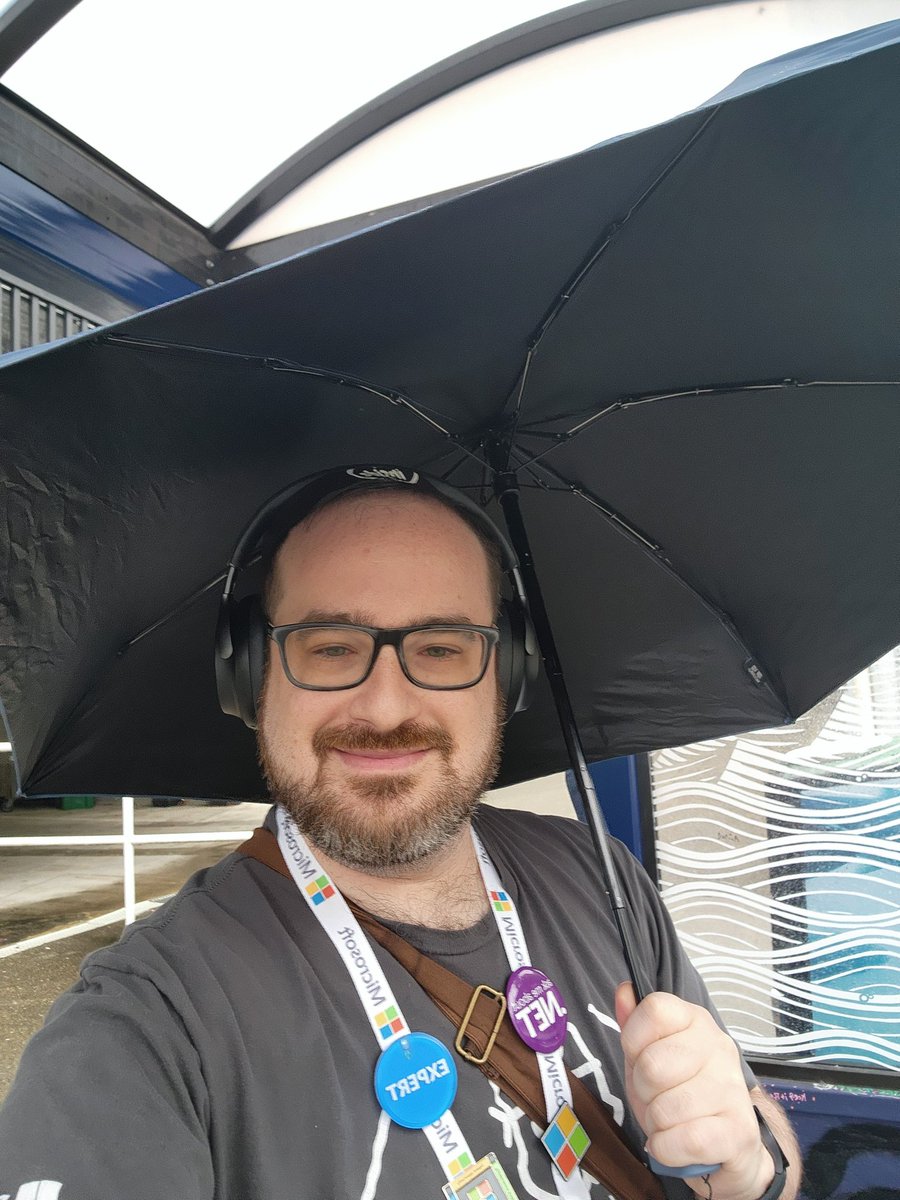 Shmuelie's tweet photo. Day one of #MSBuild! Rain of course, but that's not stopping the fun! I'm in my kilt and ready to help our developers! #dotnet #csharp #wpf #winui #microsoftstore https://t.co/iI3DJm8l0i
