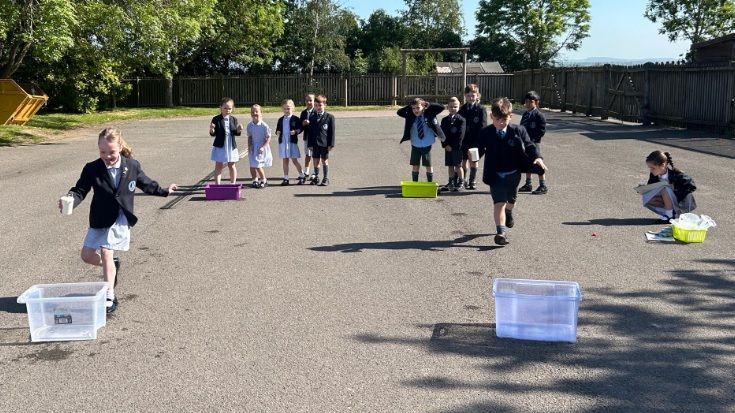 DixieGrammar's tweet image. Splashing good maths lesson today! Our &apos;Capacity Races&apos; saw fantastic teamwork as children estimated how much it would take to fill their buckets. A fun (and slightly wet!) way to learn about capacity! #MathsLearning #CapacityRaces #HandsOnMaths