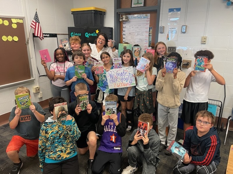 Mrs. Day's class set a goal earlier this year to read a combined 7,600 pages this year - and they met their goal! They have actually surpassed their goal and are still reading with hopes to get to 10,000 read before the end of the year. Way to read 4th graders!