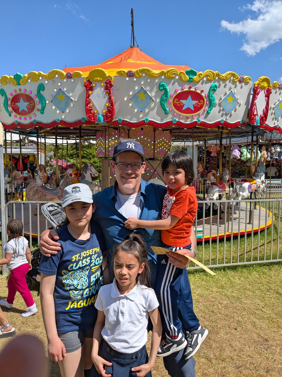Carousel ride #96 is now in the books! The Gorman family #CarouselAdventure is BACK for the season. Here we are chasing the smiles with a spin on this charming carny carousel at the Rochester Lilac Festival #Dadlife