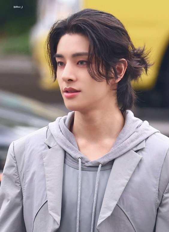 ENHYPEN's Jake with a manbun, 2024.