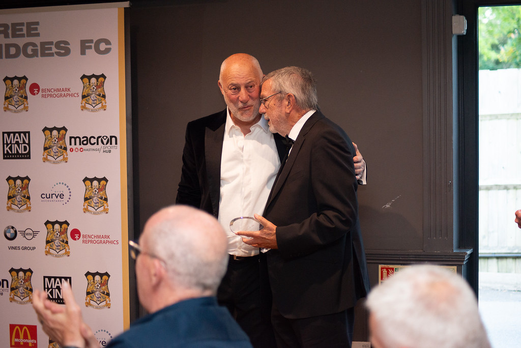 ThreeBridgesFC's tweet photo. We began Saturday's awards night by honouring a man who, without him, there would be no Three Bridges Football Club.

Part of the football club for over 50 years. Player, Chairman and now President. Mr Alan Bell 👏🏼

#UpTheBridges🧡🖤 https://t.co/zmFI3IIFoz