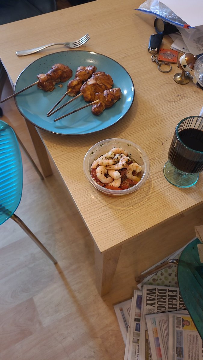 Chicken skewers with prawn and tomato. Tasty meal.