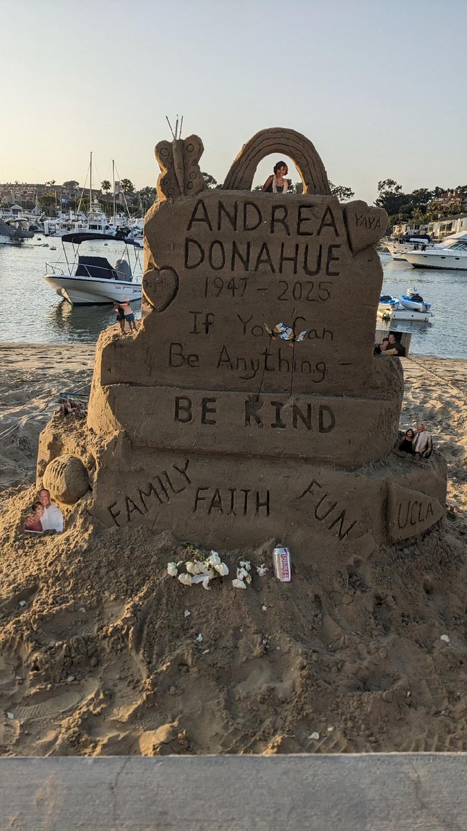 Sand sculpture across from the Donahue residence on Balboa Island, where they lived for many years. Andrea Donahue, who passed away this month, was the longtime wife of legendary former UCLA football coach Terry Donahue. <a href="/balboaislandca/">Balboa Island</a> <a href="/balboaislandvi/">The Village Inn</a> <a href="/BalboaIslandMus/">Balboa Island Museum</a>