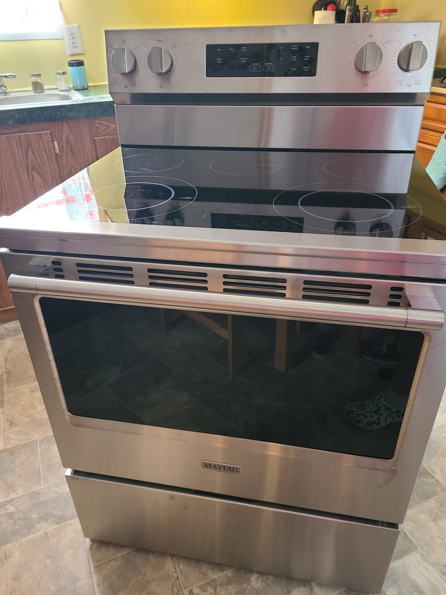 Yay! Stove has arrived! My air conditioner even got an A+ on its check up today!