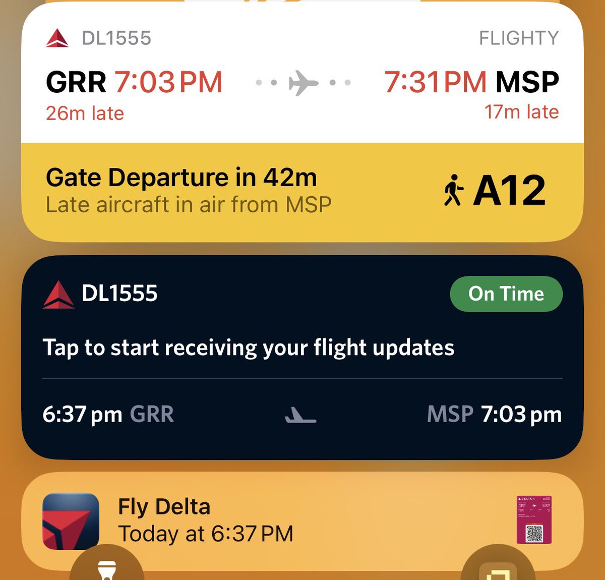 Live activities from <a href="/Flighty/">Flighty</a> (top), <a href="/Delta/">Delta</a> (bottom). Let’s just say that no matter how many times you tap, you’re not going to get flight updates. Also, the flight is definitely not on time (as Flighty knows but apparently Delta does not).