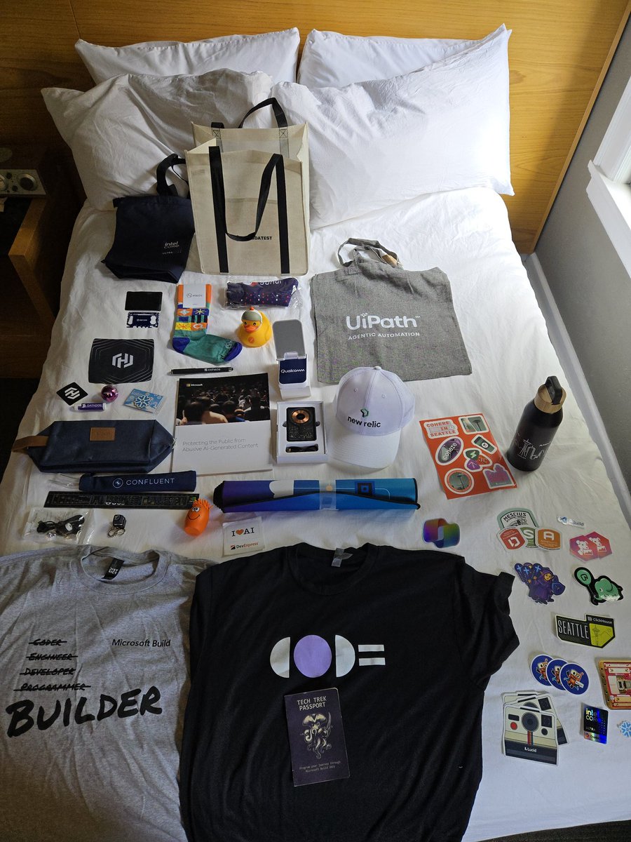 SaveYouNotThem's tweet photo. #msbuild2025 swag bag for completed passports and some walking around stickers. #StickerSwag https://t.co/1W1iFYYdqY
