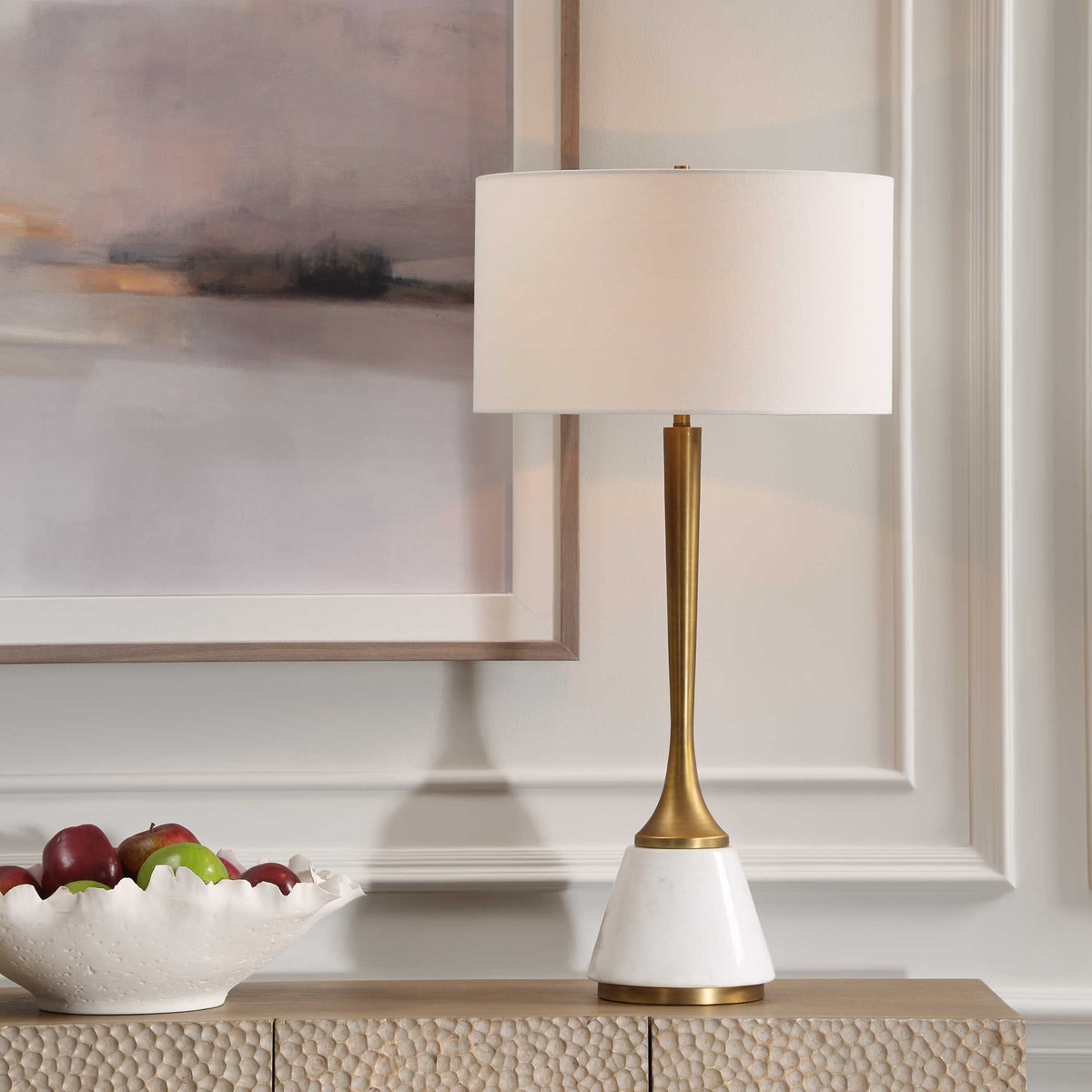 If you are loving the look of brass, check out our new Avola Table Lamp with a fusion of white marble and plated antique brass with an elegant fluted-style neck. #uttermost #carolynkinder #homedecor #interiordesign uttermost.com/avola-table-la…