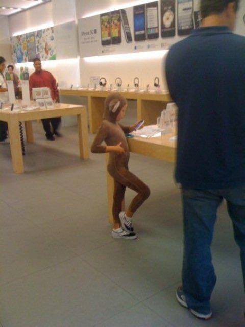 Why is she standing like the little monkey kid at an Apple Store?