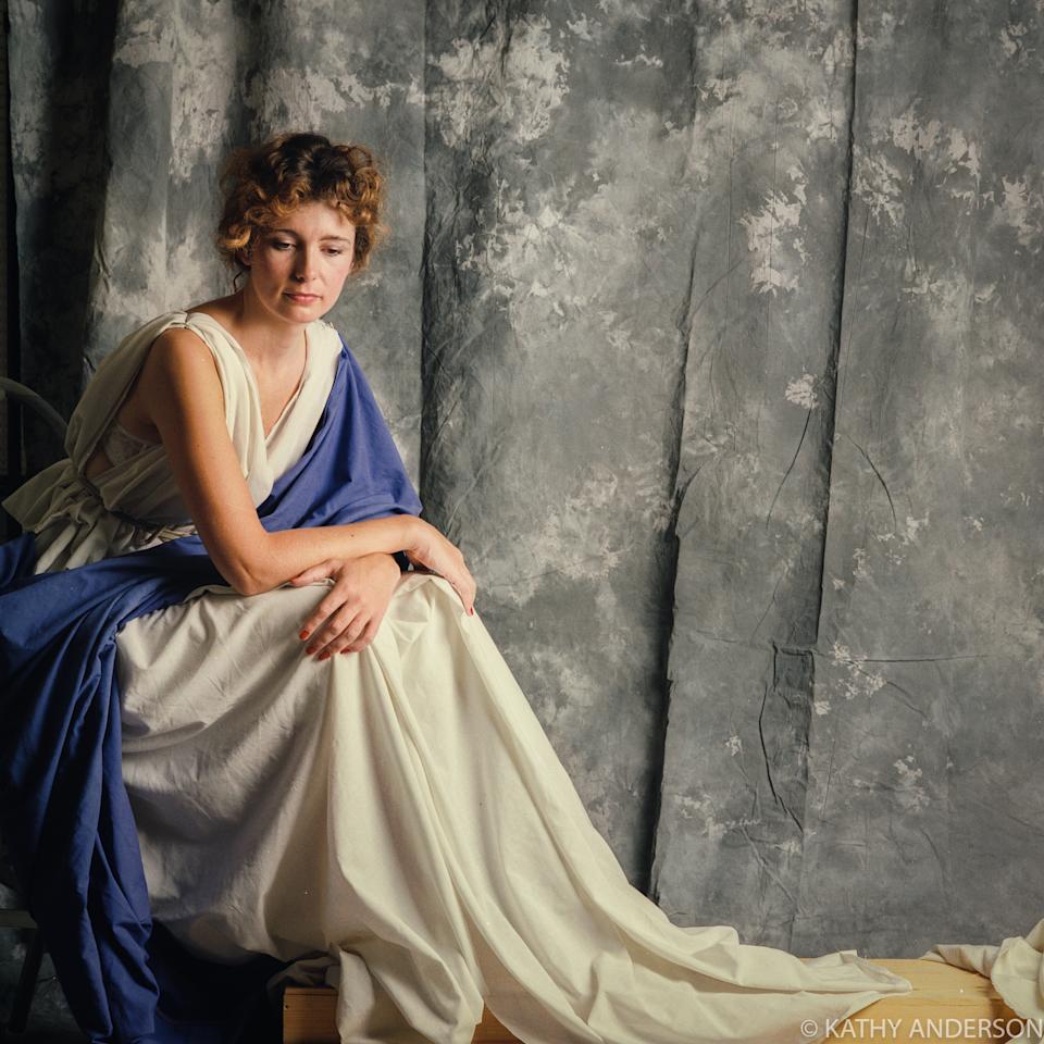 In 1992, graphic artist Jenny Joseph posed in a sheet holding a desk lamp-unknowingly becoming the face of Columbia Pictures' iconic "Torch Lady" logo still used today.