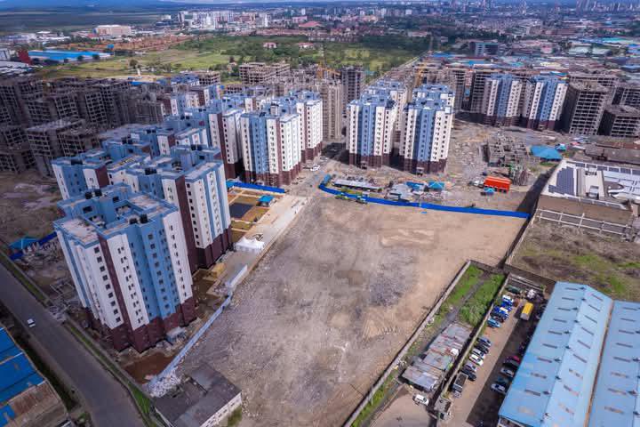 MwendiaJnr's tweet photo. TODAY, May 20, 2025 : President William Ruto is presiding over the #MukuruHandOver, delivering keys to 1,080 households in Nairobi’s Mukuru kwa Njenga under Kenya’s Affordable Housing Programme (AHP). This Phase 1 milestone transforms lives, moving families from informal settlements to modern homes.

Project Highlights 

- Scale: Part of 13,248 units across 56 acres, offering bedsitters, 1- and 2-bedroom units for ~110,000 Mukuru residents.  

- Affordability : Rent-to-own model—bedsitters priced at KSh 640,000, with monthly payments of KSh 3,896 (including services). The government subsidizes a 10% deposit for low-income earners.
  
- Impact: Replaces flood- and fire-prone shacks with safe, dignified homes featuring elevators, modern drainage, and sewer systems.  

🌟 Community Transformation
-Safety : Designed to prevent disasters like the 2011 Sinai fire tragedy.  
-Jobs : Created over 3,000 local jobs, contributing to 160,000 nationwide through AHP.  

- Urban Upgrade : Transforms Mukuru’s skyline from iron-sheet shacks to modern apartments.