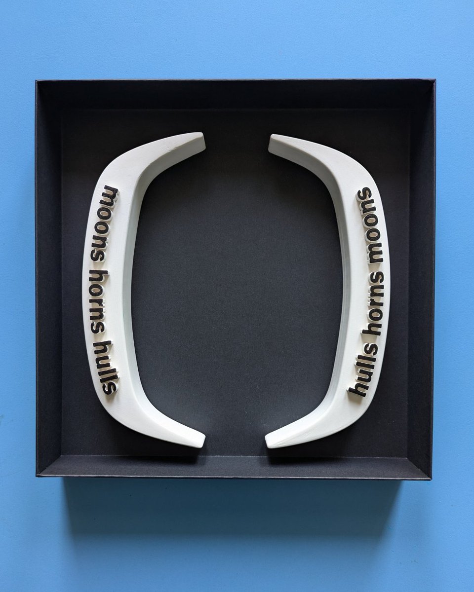 Gregchthomas's tweet image. There’s a new Oo poem-object in the world.

*parenthesis poem (moons horns hulls)* is a duo of Jesmonite poem-objects cast from 3D-printed originals, with detail in black acrylic paint pen. Posted in black presentation box. Its sold out but I thought folks might like to see it.