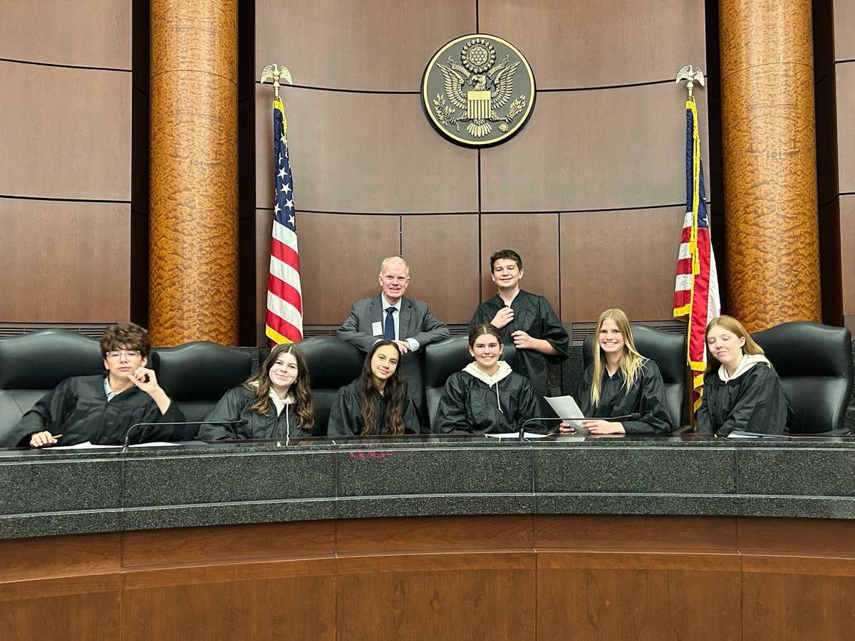 USCourtsMOED's tweet image. 8th Grade from Our Lady of Lourdes UCity at #LawDay event 5/13. They were welcomed by Chief Judge Clark, observed court, & participated in a moot court helped by judge & attorney coaches. Congrats to Alex Hatcher and Sofia Otten, winners of the essay contest hosted by @JLCinSTL