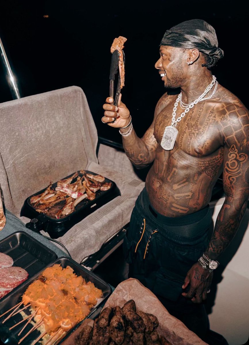 Asake stuns in new photo 📸