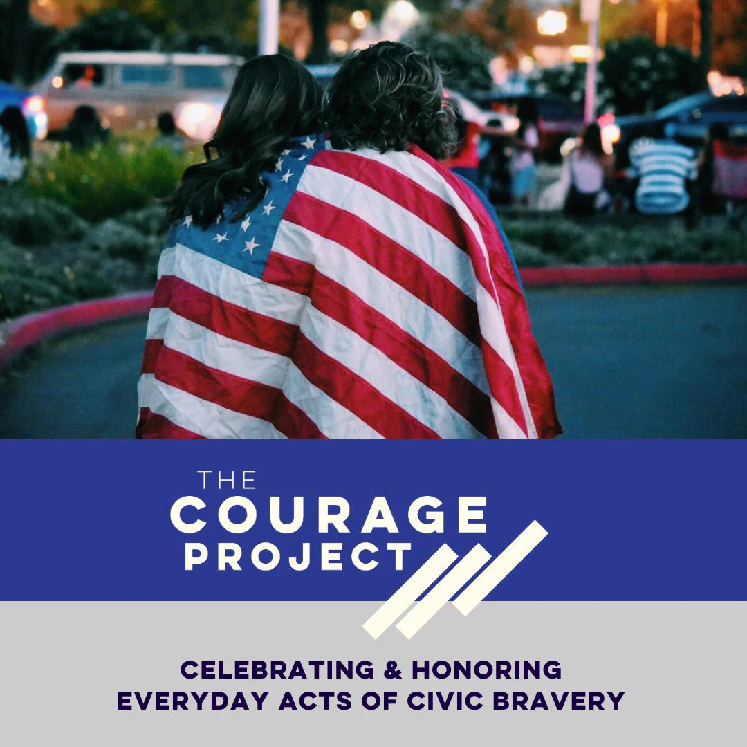 Two individuals wrapped in an American flag, viewed from behind. The image includes a logo for "The Courage Project."