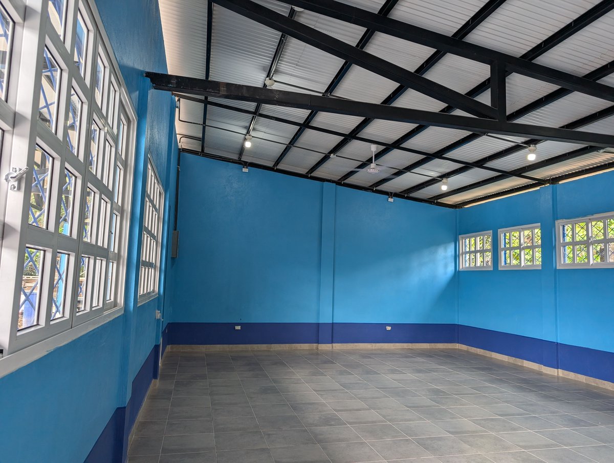 There's been so much incredible progress at the school we're building with Seeds for Progress lately, but we bet the first thing you'd notice is that it's blue! 🔵 👀 Our in-country team (plus our doggie mascot) has been hard at work painting in two beautiful shades of blue. 🖌️🏫