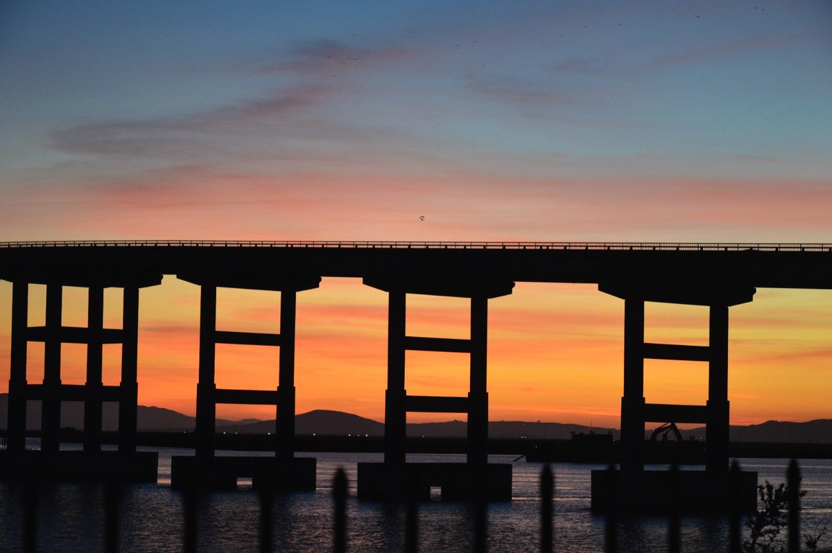 Memorial Day Sunset. Shot yesterday, (in order) through the pillars of the Hwy 37/Napa River bridge in Vallejo, California. #sunsetphotography