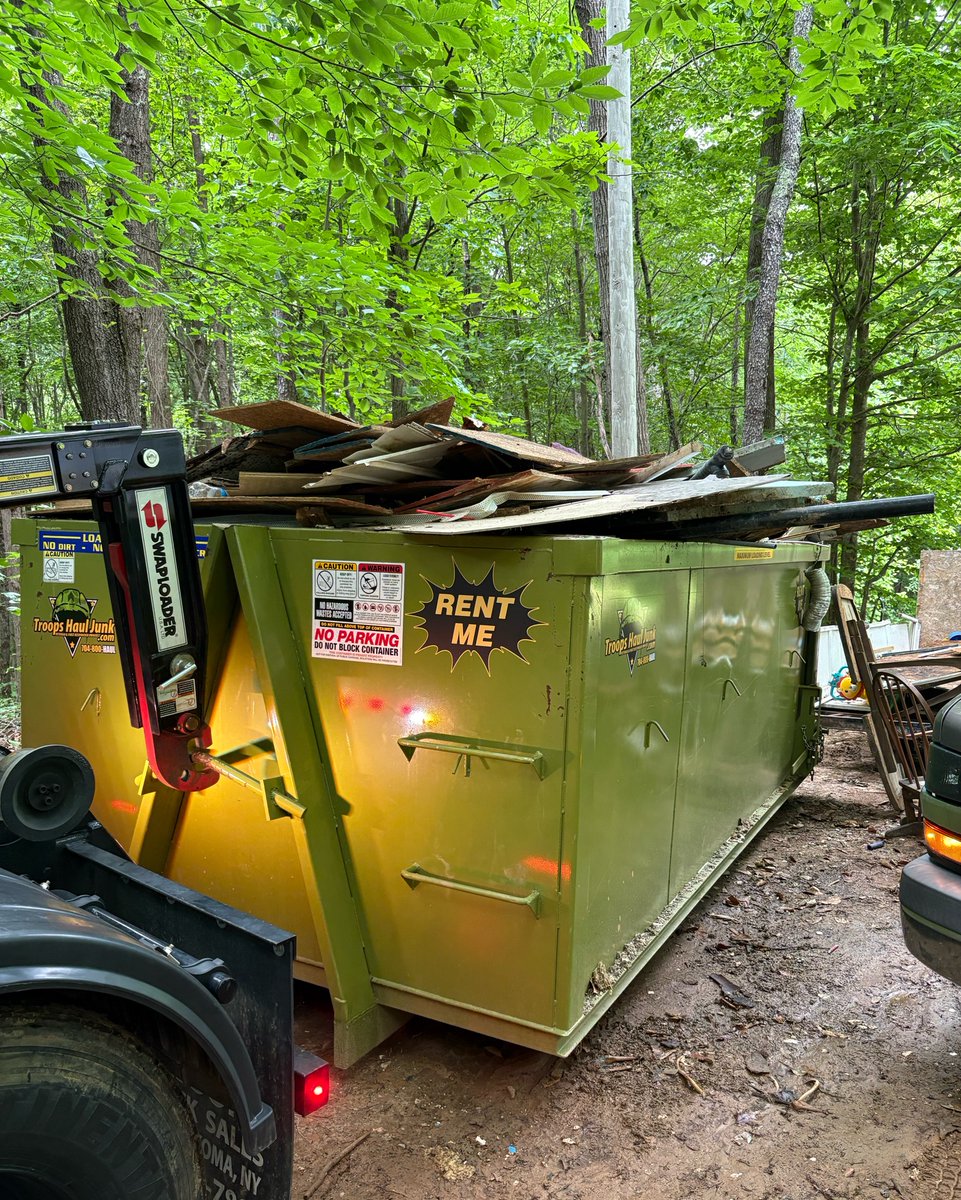 TroopsHaulJunk's tweet photo. Money Saving Tip- Don’t overload our dumpsters to avoid extra fees! This is unsafe to haul down the public streets. Had to give the dumpster a little Shake-N-Bake! 👊🇺🇸 https://t.co/Bt4E0gluhJ