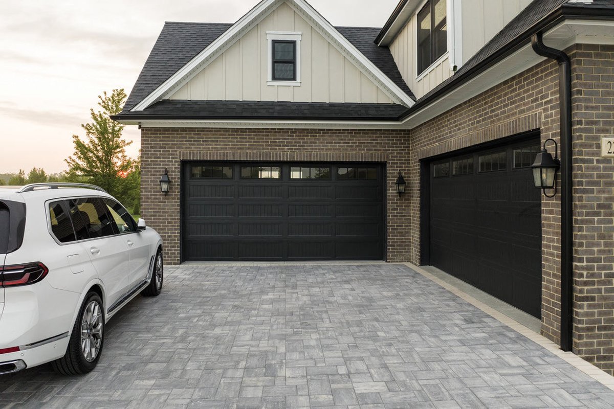 County Materials' concrete pavers transformed this home’s entryway with a stunning walkway and pass-through driveway, seamlessly connecting two street entrances. Our durable, stylish paving solutions can enhance any home's curb appeal.

See more: hubs.li/Q03kkSBl0