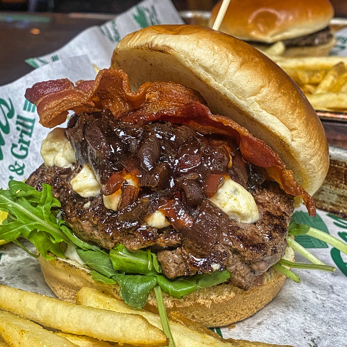 Your gonna have to find a way to get yourself out to New Trier this week!
The Blues Burger! Topped with bleu cheese crumbles, bacon, red onion jam, arugula, and garlic mayo!
Served Tues-Thurs this week at Dan's! 💙🍔