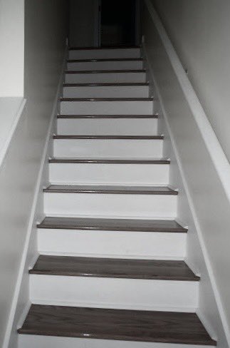ltoms91's tweet photo. To most people, it looks like just a staircase. 
Simple lines, black and white. But I know what it really is. This is a very specific place. A frozen moment in time. It’s where I first met five boys who didn’t know the world yet, but were already building mine. Sitting on those- https://t.co/NuDESwI12c