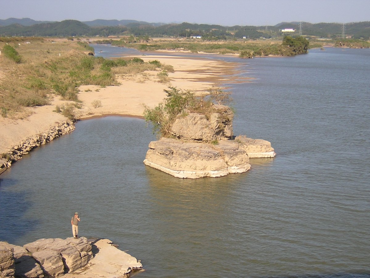 The Nam River in S. Korea. I caught a lot of non-native largemouth bass along the cliffs of the rock island. Wade out, bang a streamer against the rock face, let it sink for a moment and strip it in.