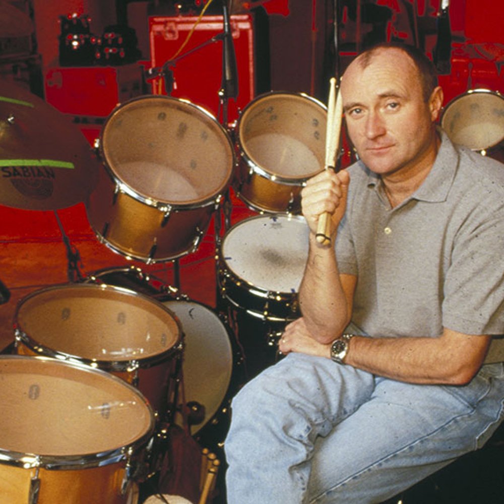 Phil pictured behind the kit, recording for "Tarzan" in 1999.

📸 <a href="/Disney/">Disney</a>