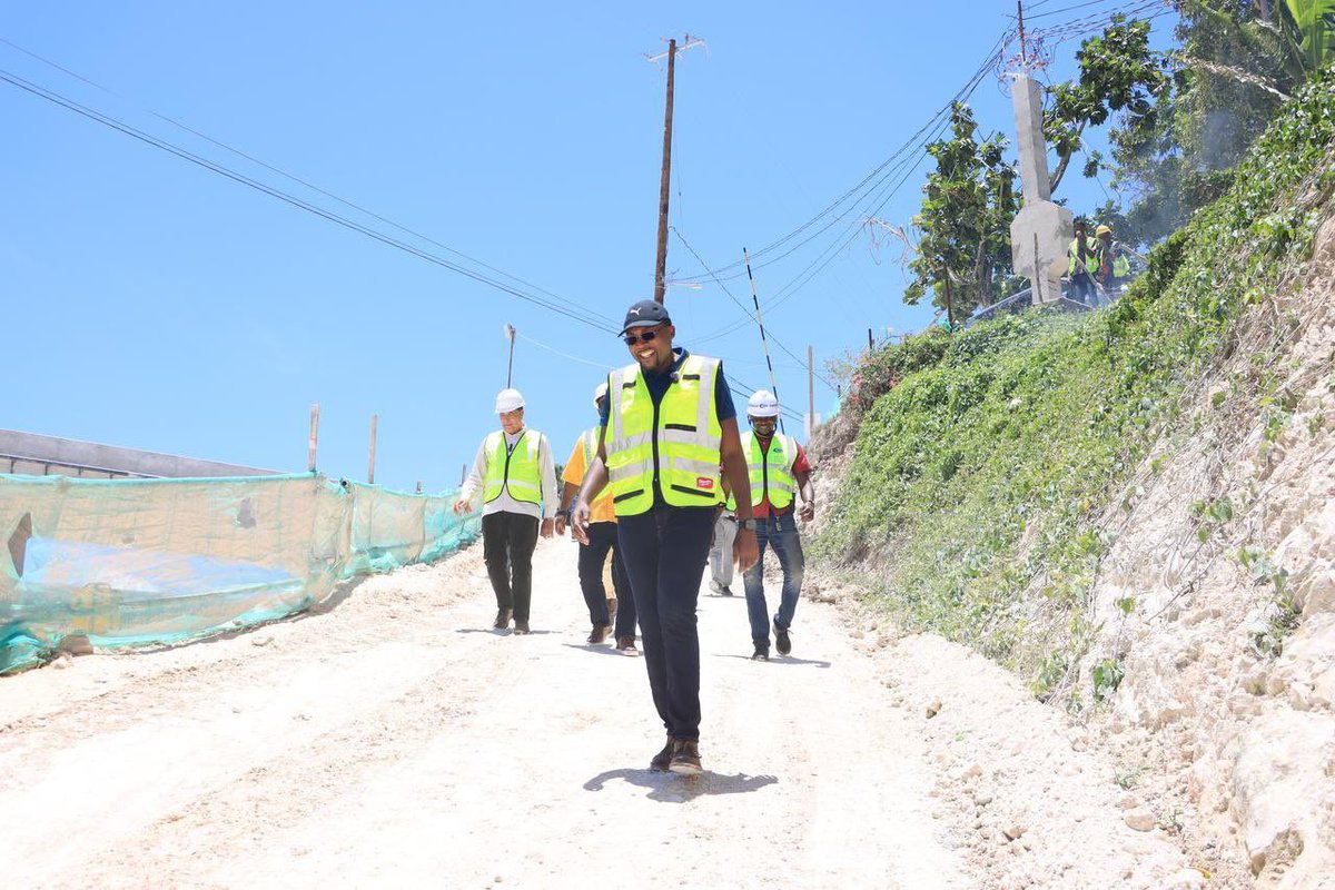 NROCCJamaica's tweet photo. Hon. Robert Morgan, Minister of Works, recently toured sections of the Montego Bay Perimeter Road Project to see the progress firsthand! π§ποΈ Exciting developments are underway as we continue building a better Jamaica. #NROCC #BuildingJamaica #MBPRP https://t.co/TMRJ4zxj8M