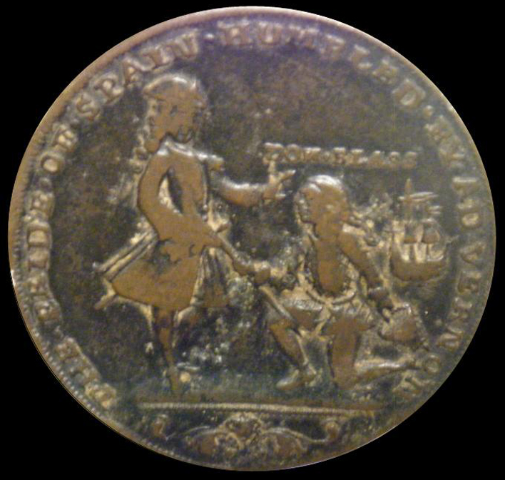 Éste es un ejemplo de las medallas que fabricaron los ingleses para celebrar la "conquista" de Cartagena de Indias en 1741. En este caso la inscripción dice: "The pride of Spain humbled by Ad. Vernon", que significa "El orgullo de España humillado por el almirante Vernon".