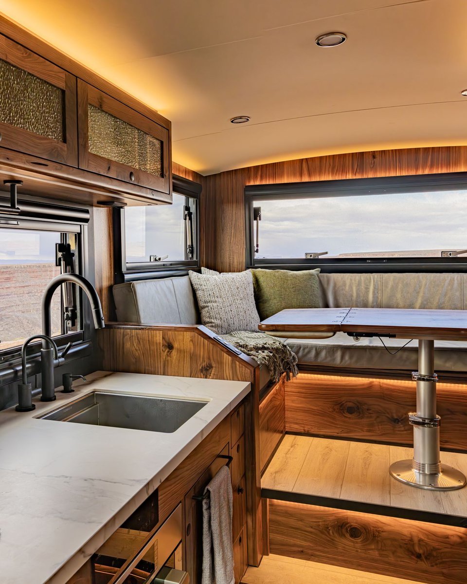 Crafted for the trail, finished like a home.
Hand-stitched leather, real wood cabinetry, and panoramic views that keep you connected to the landscape—without giving up an ounce of comfort.

Built to roam. Designed to last. Styled to feel like nowhere else.