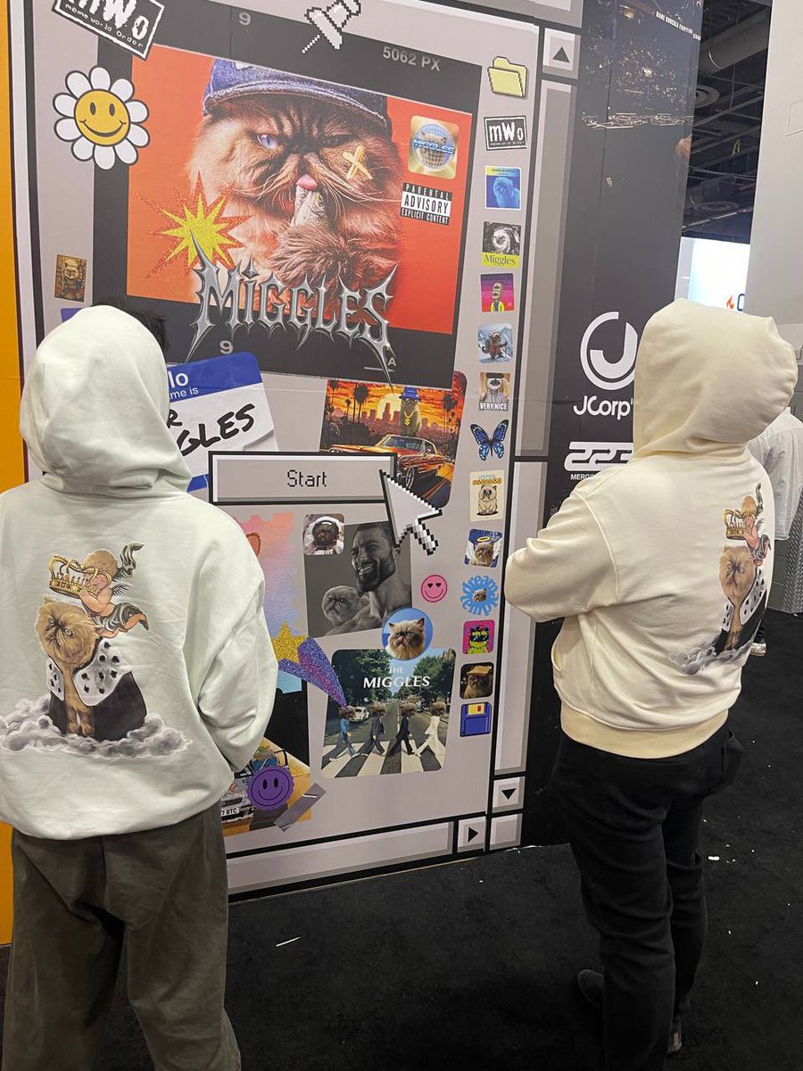 LandLady108's tweet photo. My honor to present #miggles community arts on this 10ft tall window95 mural at @licensingexpo 2025 in Las Vegas.💗

Find your memes! 
@MigglesArtist @warningjeil @getready4wt @m3owlord @heymojo_jojo @doms4ever @greencrosslive @MrMigglesOnBase @dreamtemple_ @tylerocket @The_MemeMachine 💗