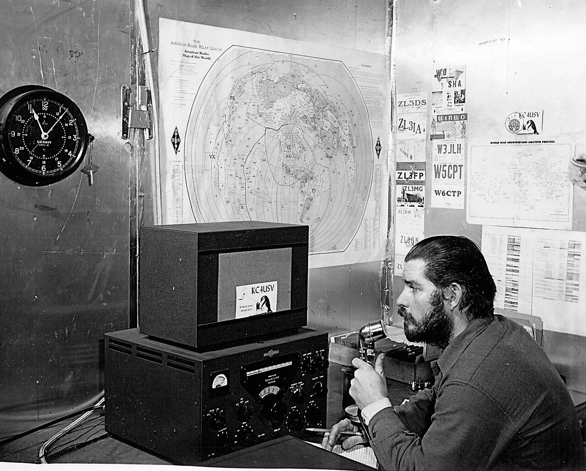 cqcqcqdx's tweet photo. KC4USV  U.S. Navy Chief Petty Officer Adrey Garret uses ham radio at Williams Air Operating Facility during the 1956 winter. Ham radio was the only means of voice communication with friends and family back in the U.S. for navy personnel living and working in Antarctica. https://t.co/K2Ye6iptSg