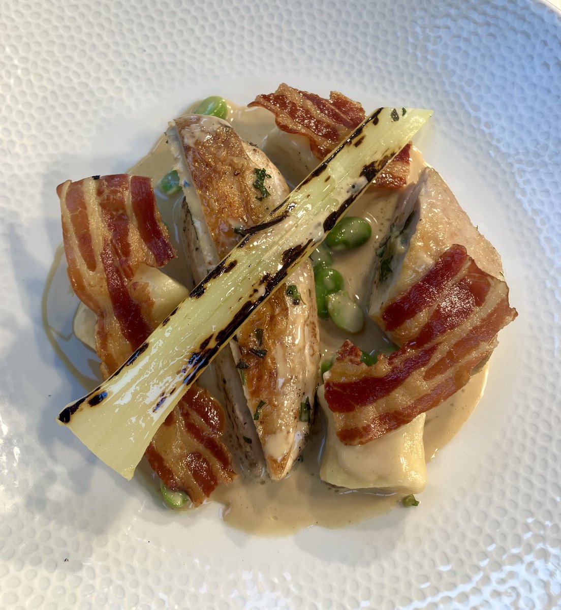 Herb-roast chicken, Caesar velouté, potato gnocchi and grilled leek