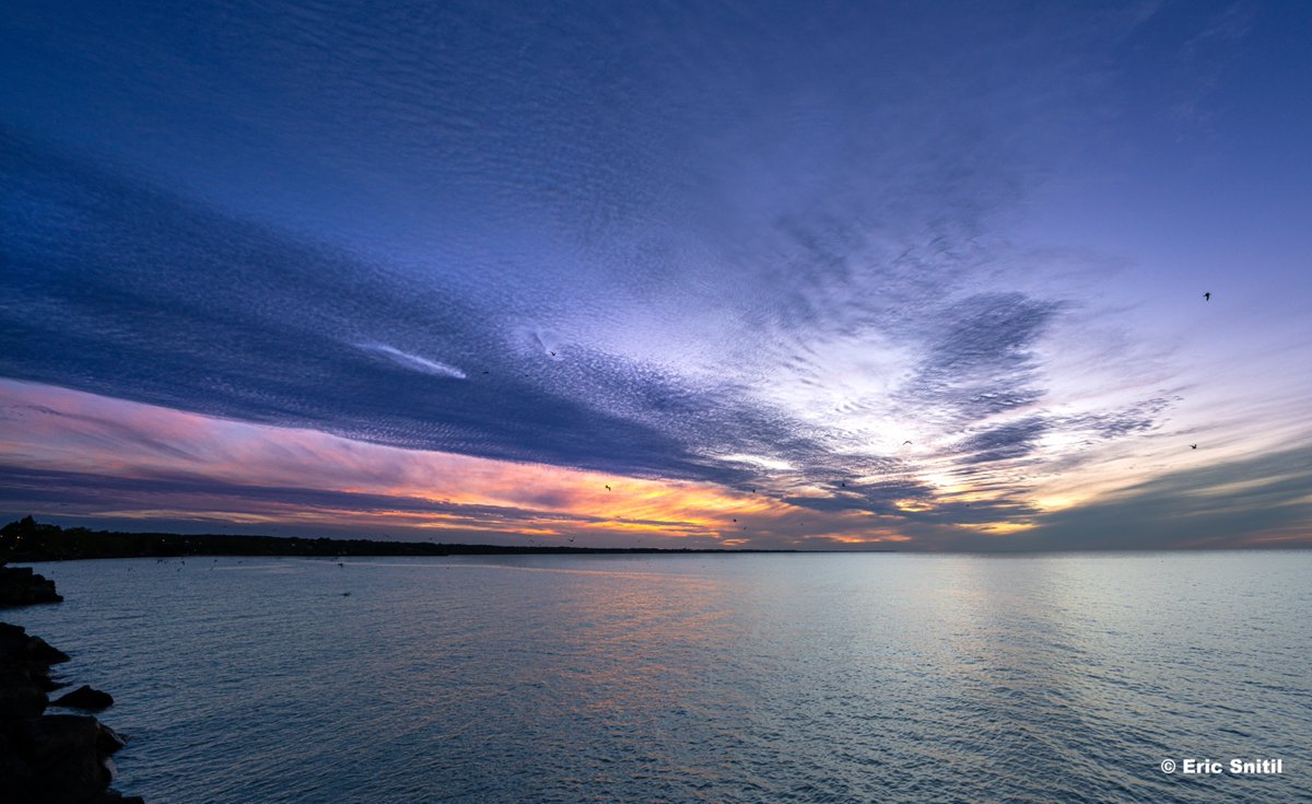 A beautifully textured sky at sunset this evening as moisture aloft starts to move in. Clear skies are nice but clouds can make for the best sunsets. Captured over Lake Ontario from Webster.