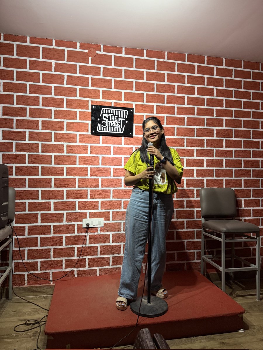 HumansofHyd's tweet photo. "Happiness was an illusion before comedy happened to me.

I’m Sravanthi, born and raised in Hyderabad. Honestly, I can’t imagine growing up anywhere else. Even after living in the US and travelling, nothing compares to the feeling of home this city gives. It’s here that I understood freedom, where I saw equality, and where my parents raised me and my sister with the same love and encouragement to explore the arts. We were raised like middle-class princesses and treated like celebrities even before I ever held the mic—that’s just how my parents brought us up.

I wasn’t always someone who could get on stage and make a room full of strangers laugh. I was a textbook introvert. I topped in school but barely spoke. No one could get a word out of me—not teachers, not even family. I carried a lot of anger back then—towards situations, and the world. Comedy changed that.

My journey began with Engineering, then an MBA, and eventually a Master’s in IT from the US. Like many of us, I stumbled onto stand-up through Netflix and thought, “If they can do it, maybe I can too.” I later realised it’s a craft, and everyone’s figuring it out in their own way. But that first spark pointed me in the right direction.

My shows—Strictly 18+ Kids Only, A Certificate, and Man’s Woman—aren’t just stand-up sets. They’re slices of life. I talk about things people often avoid: domestic violence, death, cheating, mental health, queer identities. Not to shock or offend, but to find humour in discomfort. Life’s already serious enough; I’m just trying to make it a little easier to face.

I perform in a mix of Telugu and English—just the way we speak at home. The audience gets it, because they get me. After some shows, people have said, “I’ve never felt more alive,” or “You said things I’ve never been able to say out loud.” That kind of connection keeps me going.

My parents? They think they’re the real comedians in the house. According to them, my jokes aren’t dark enough!

Right now, I’m performing in Hyderabad with A Certificate and Man’s Woman. There’s a new show in the works—about love, heartbreak, and everything in between. Not titled yet, but safe to say it’ll be A-rated!

Comedy gave me a voice when I had none. It turned my anger into something that brings people together, makes them think, and most importantly—makes them laugh. And for me, that’s where true happiness begins."

— Sravanthi Basa

#standupcomedy #journey #engineer #arts #family #motivation #humour #hyderabad #HumansofHyderabad