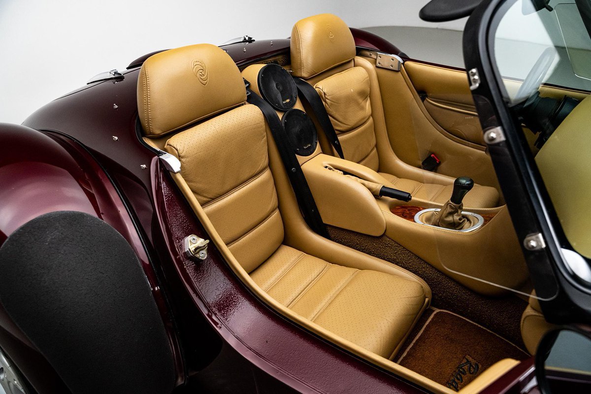 1998 Panoz AIV Roadster

sold for $41,300

Only around 220 units were made
drove 16,400 miles

4.6L Supercharged V8
RWD, 5-speed manual
limited-slip differential