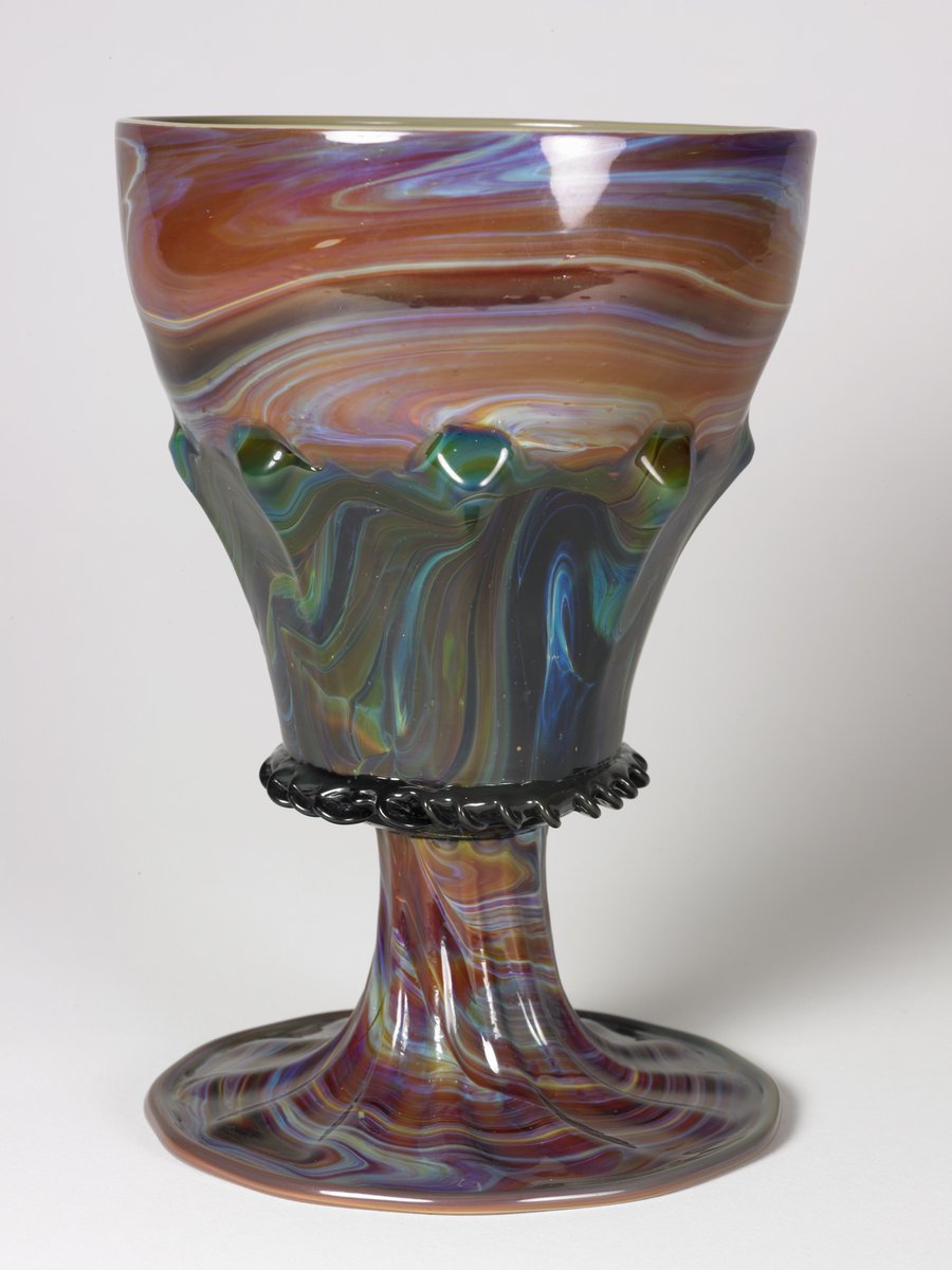 WallaceMuseum's tweet photo. Do you notice the swirling purple curves? Highly skilled Renaissance artisans created this Venetian goblet in the 'calcedonio' style to emulate precious stones like rock crystal, evoking Roman objects and foreign lands.
#VenetianGlass #WallaceCollection #DecorativeArts https://t.co/fL1jPefBJq
