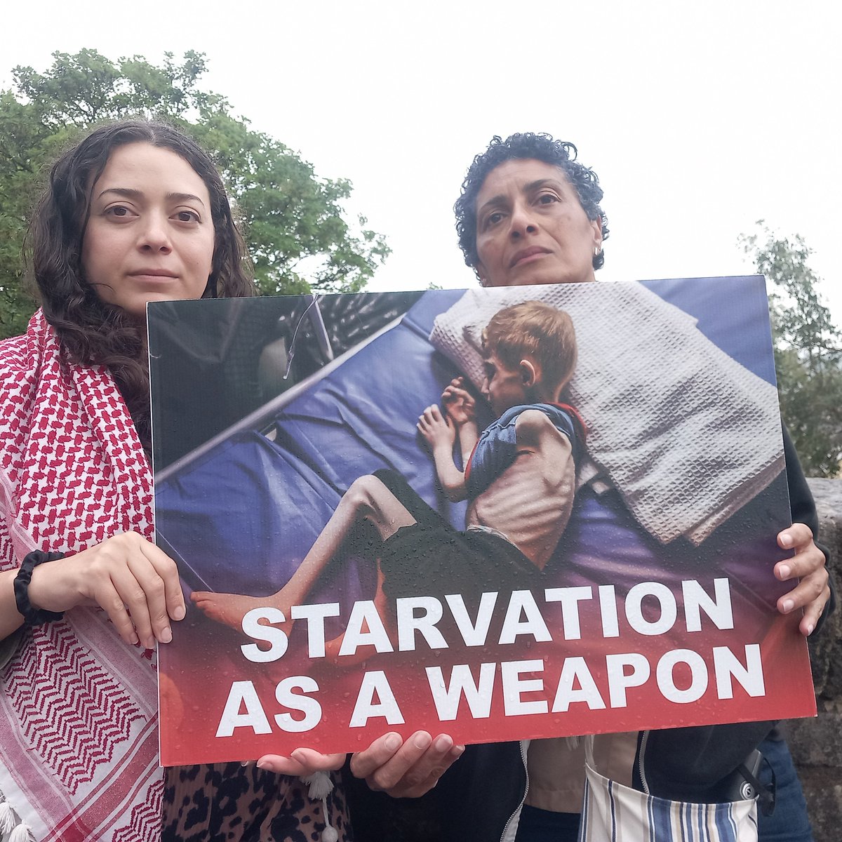 Protesting Israel's genocide against Palestinians.

Especially important for us today - mum has cancer, and my dad died from cancer 5 months ago. She is wearing his keffiyeh.

Israel destroyed Gaza's only cancer hospital. Gazan's will not be able to receive life saving treatment.