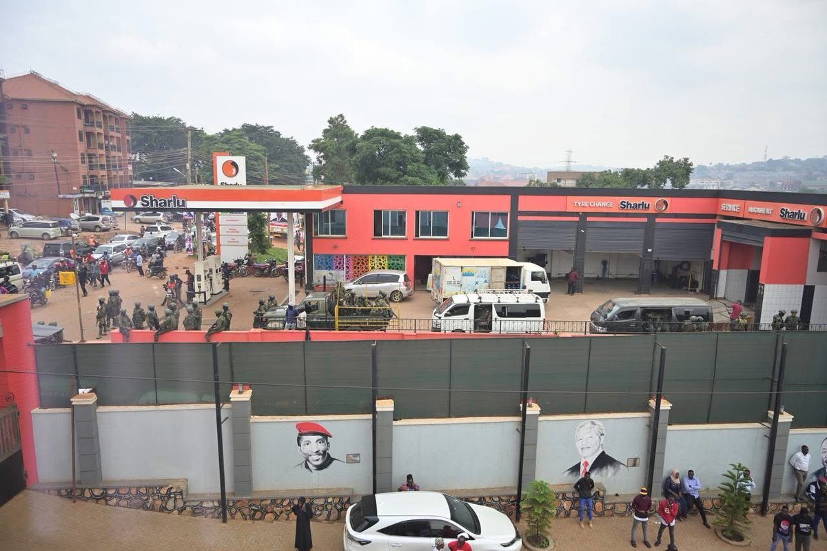 HEBobiwine's tweet photo. We are holding a party event at the National Unity Platform Headquarters, and this is how much they have deployed all around, as though we're in a war zone. Their fear is greater than their wickedness! 
#FreeUganda https://t.co/uvQUKC8tUq