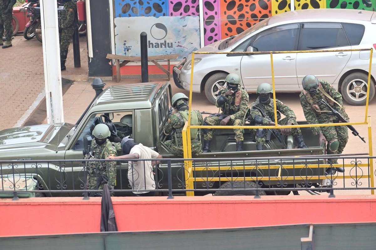 HEBobiwine's tweet photo. We are holding a party event at the National Unity Platform Headquarters, and this is how much they have deployed all around, as though we're in a war zone. Their fear is greater than their wickedness! 
#FreeUganda https://t.co/uvQUKC8tUq