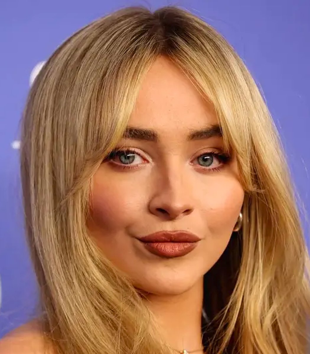 Dexerto's tweet image. Joe Rogan shows off realistic Sabrina Carpenter cake for his daughter's birthday