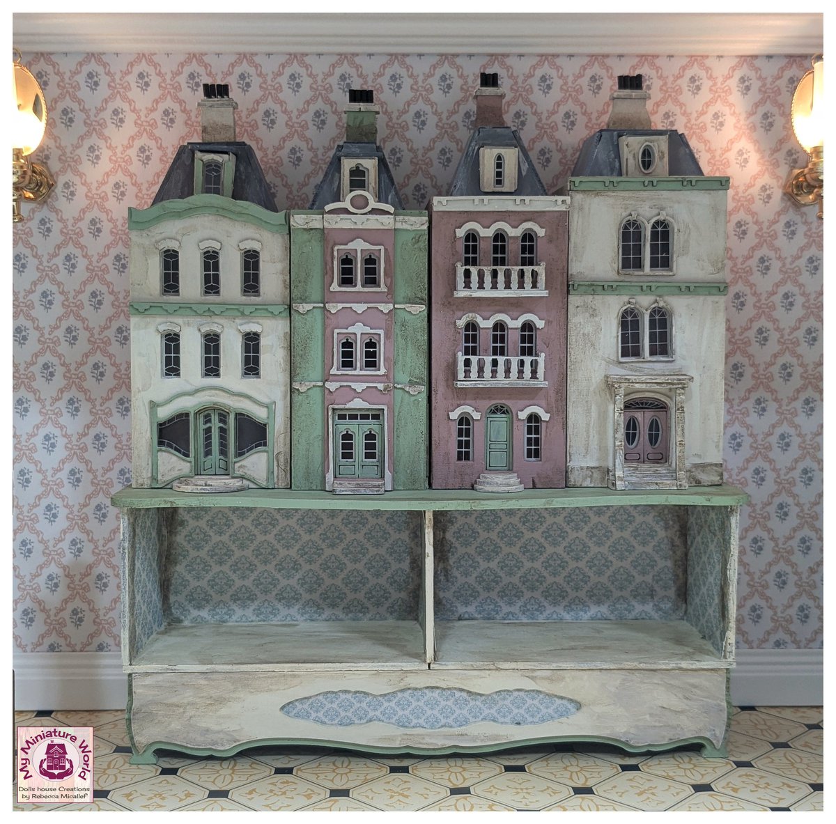 rebmicallef's tweet photo. So pleased with the new street of miniature houses and modified base. I wanted to raise the houses so I can use the space underneath.  The Victorian Miniature Parlour is going to look amazing.

#dollshouses #miniatures #petiteproperties #microscale #picoftheday #photooftheday https://t.co/Sf1FZPJGNY